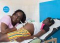 Boni Awa, 25 years, receives a pregnancy checkup from Midwife Amichia Solange, 41 years, at Mouyassue Rural Health Centre on 5th August 2019. This is Boni's third pregancy.
